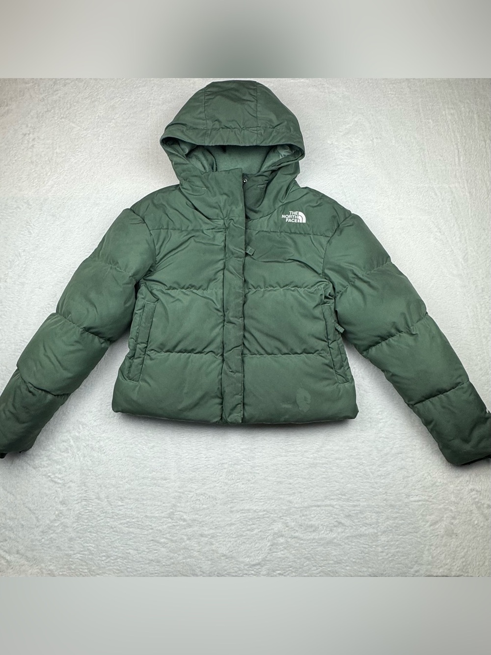 The North Face girls sage green cropped puffer hooded jacket. Size M.